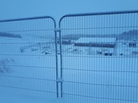A substation covered with heavy snow.