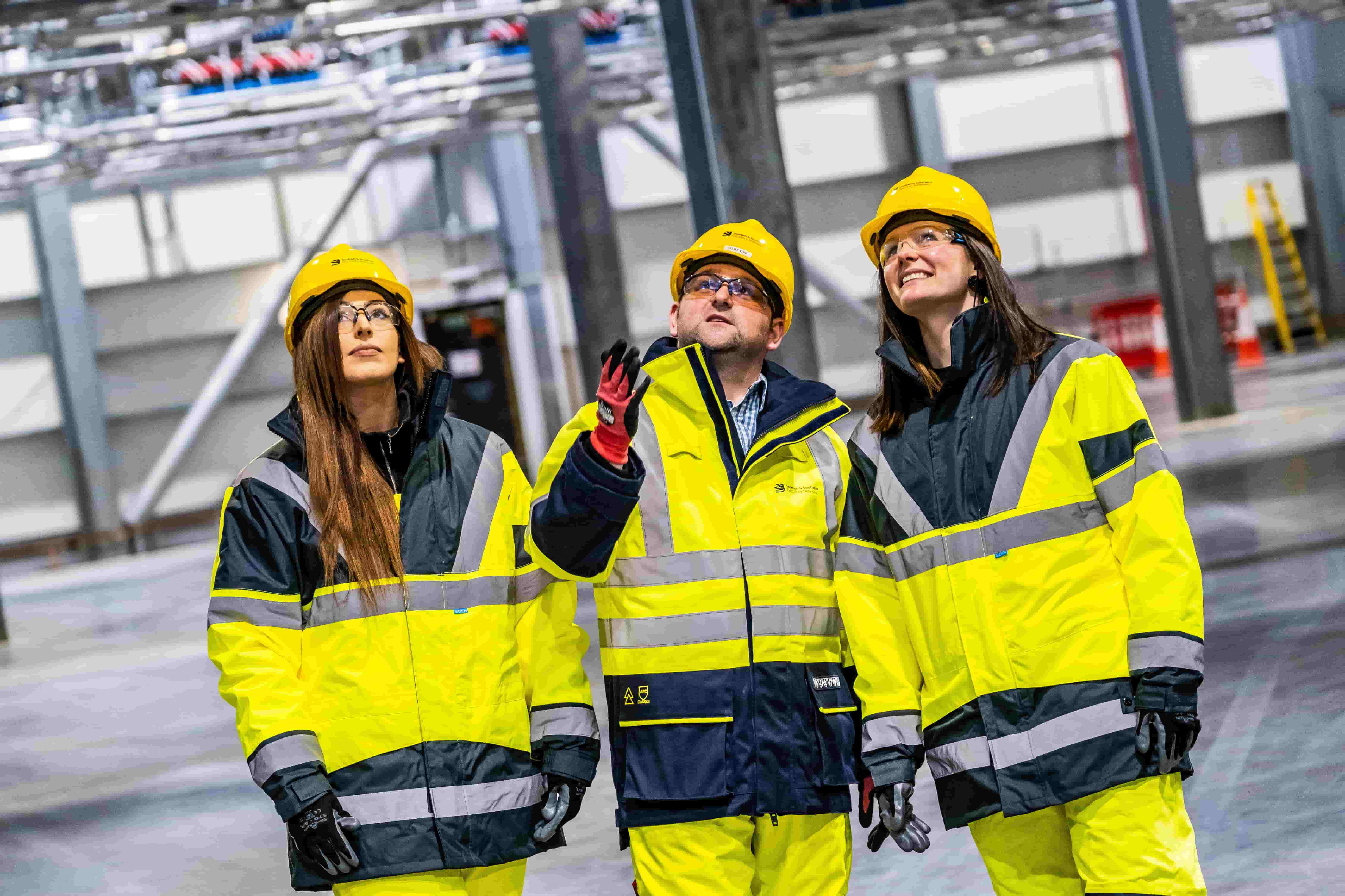 Three SSEN Transmission staff on site wearing full PPE