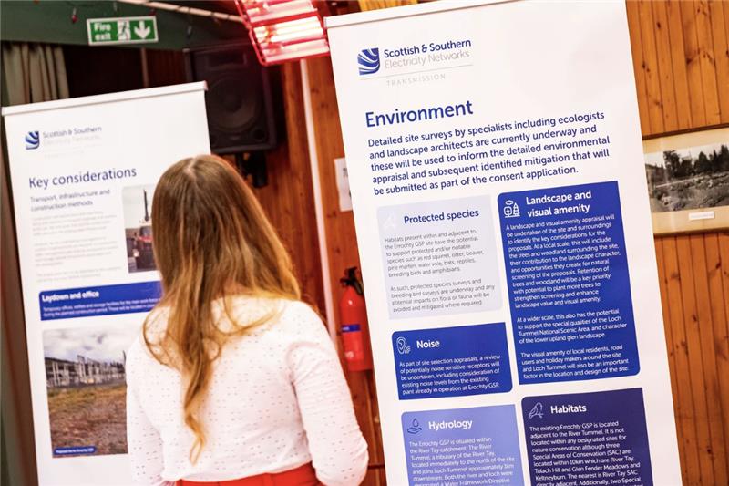 SSEN Transmission employees and members of the public examining project posters.