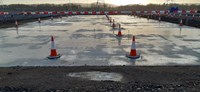 An area surfaced with concrete on a construction site.