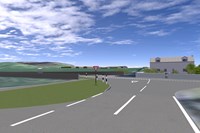 A visualisation of a road junction, in the distance a complex of buildings visible.