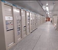 Floor to ceiling machinery control panels.