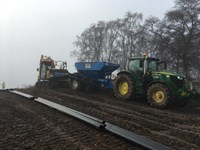Heavy Machinery on dirt Track.