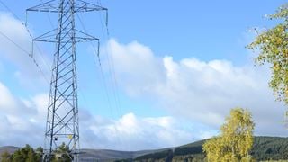 Powerlines against a cloudy sky