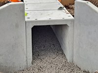 A square-edged concrete tunnel.