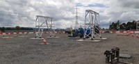 Substation structures on a construction site.