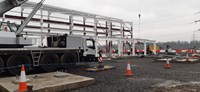 Roof purlins being installed.