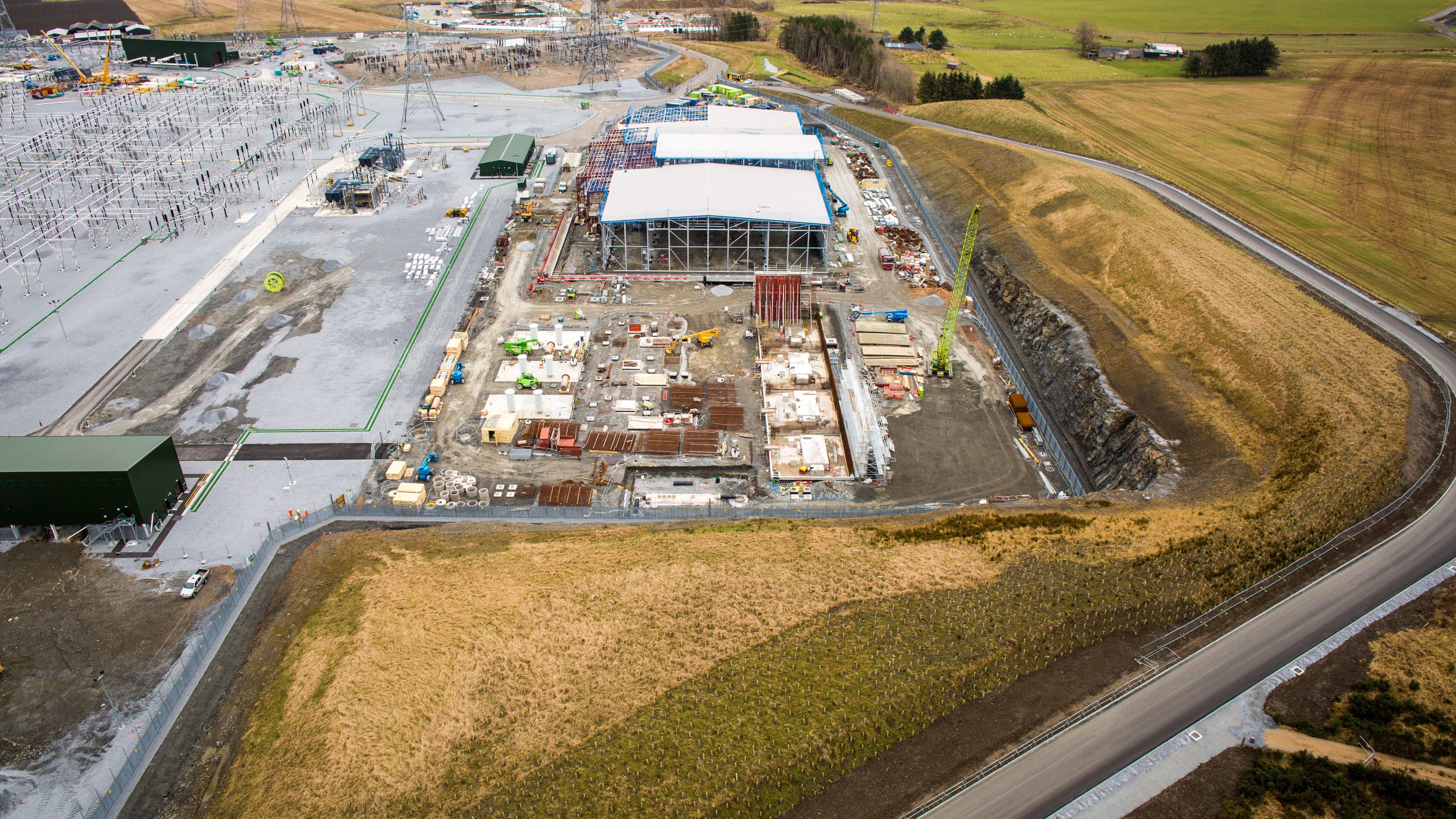 An aerial view of a substation under construction.