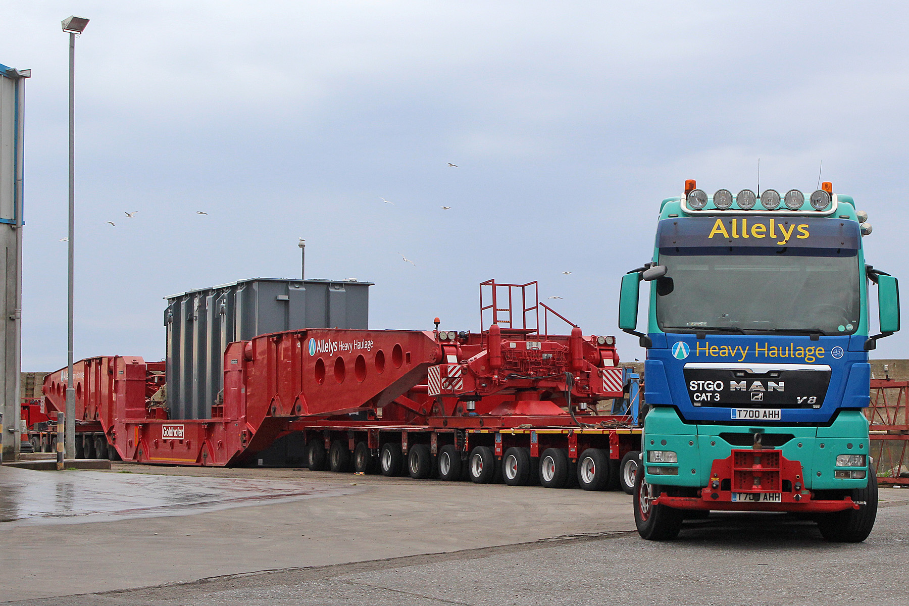 Container being transferred.