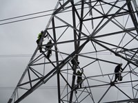 Workers on tower.