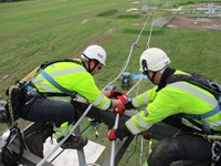 Workers carrying out works on tower.