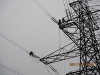 Workers carrying out works on tower.