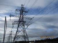 A metal transmission tower. A date reads "2021/11/05 12:49".