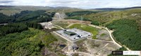 An aerial view of a substation surrounded by hills and forest. A logo in the corner states "CYBERHAWK".