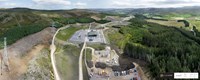 An aerial view of a substation surrounded by hills and forest. A logo in the corner states "CYBERHAWK".