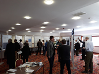 Members of the public with SSEN Transmission staff in front of project posters.