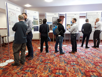 Members of the public with SSEN Transmission staff in front of project posters.