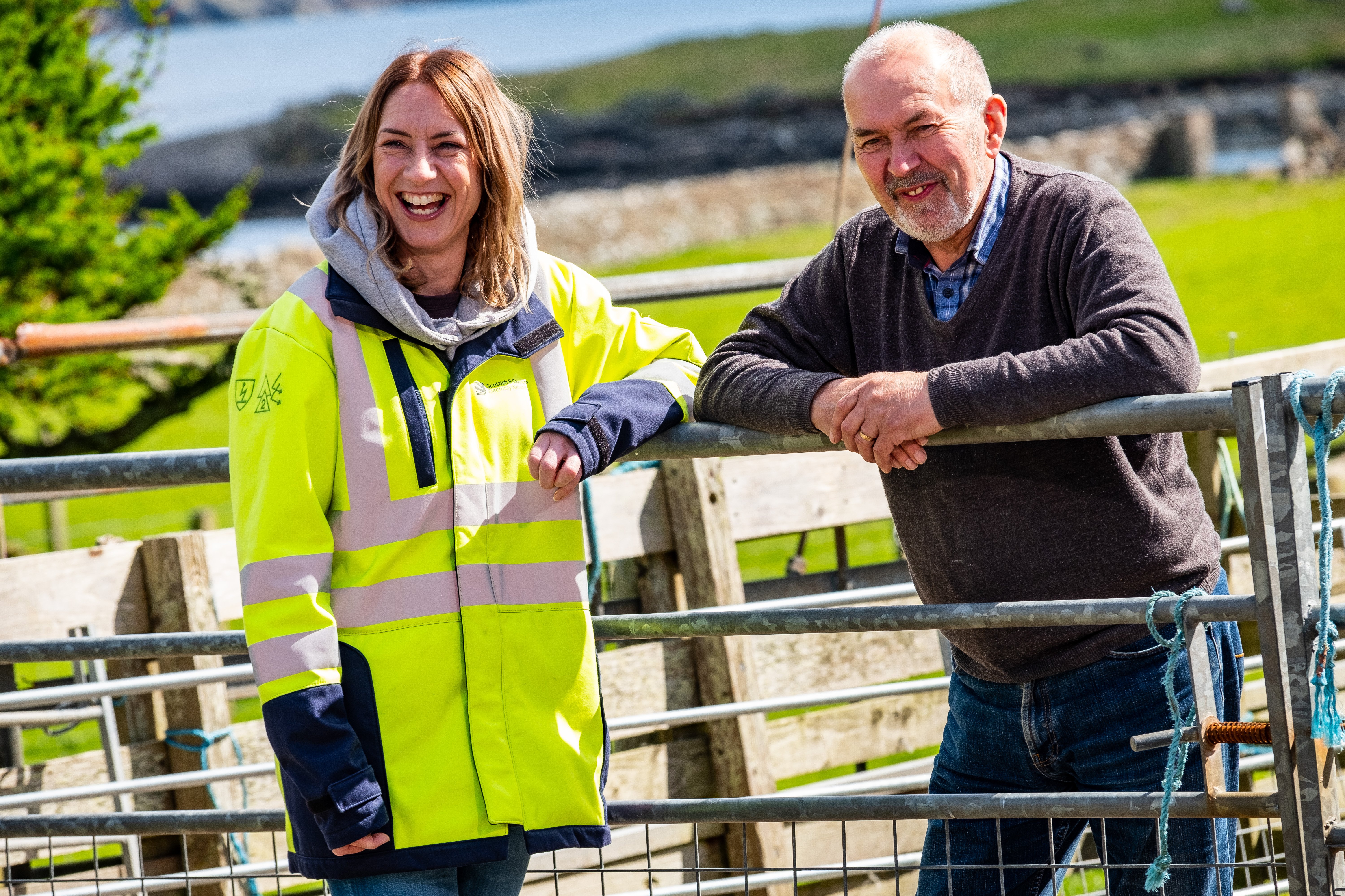 Community Liaison Manager with local farmer