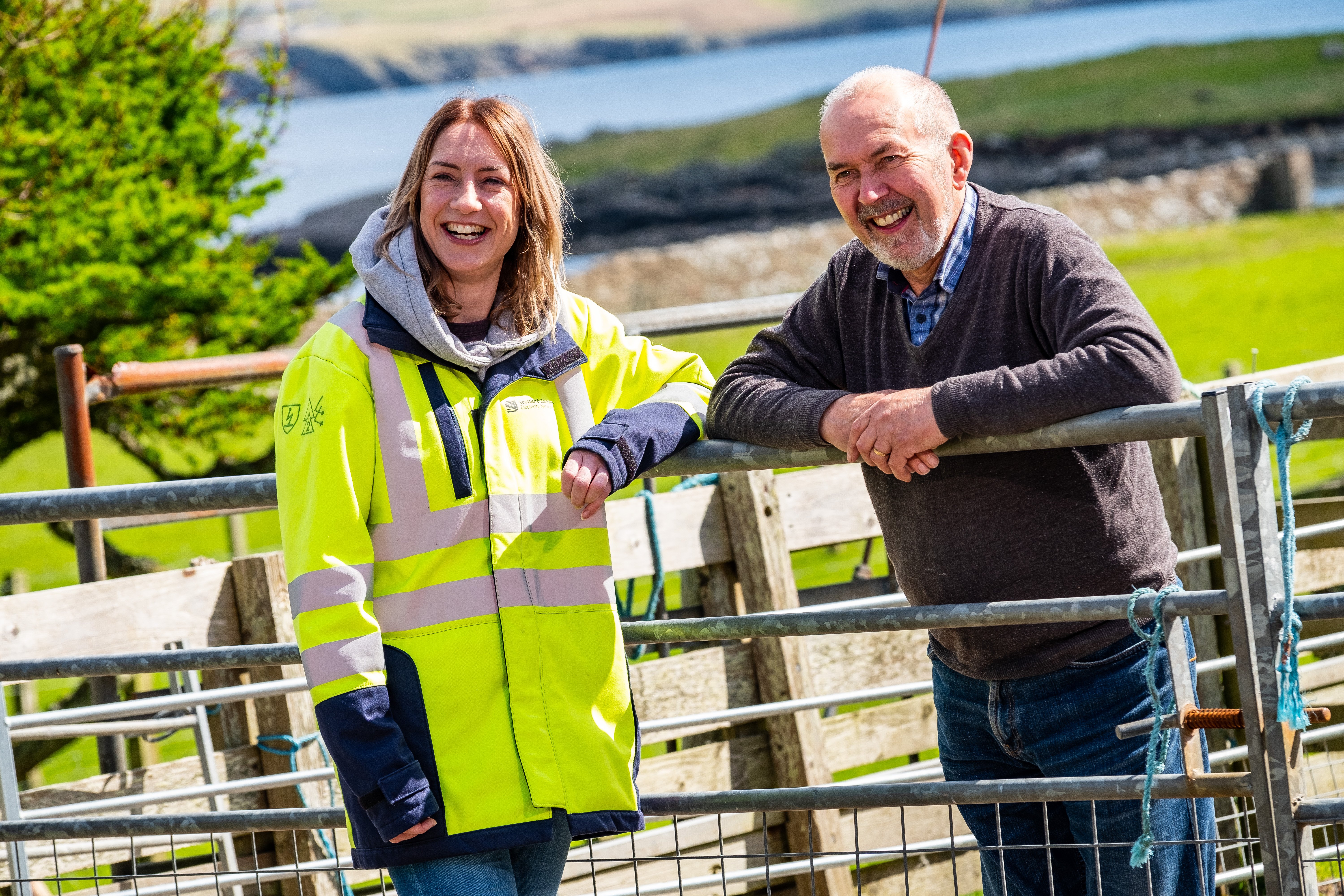 A member of our Communities team meets with a member of the local Shetland community to discuss works happening in the area. The photograph captures SSEN Transmission's community spirit.