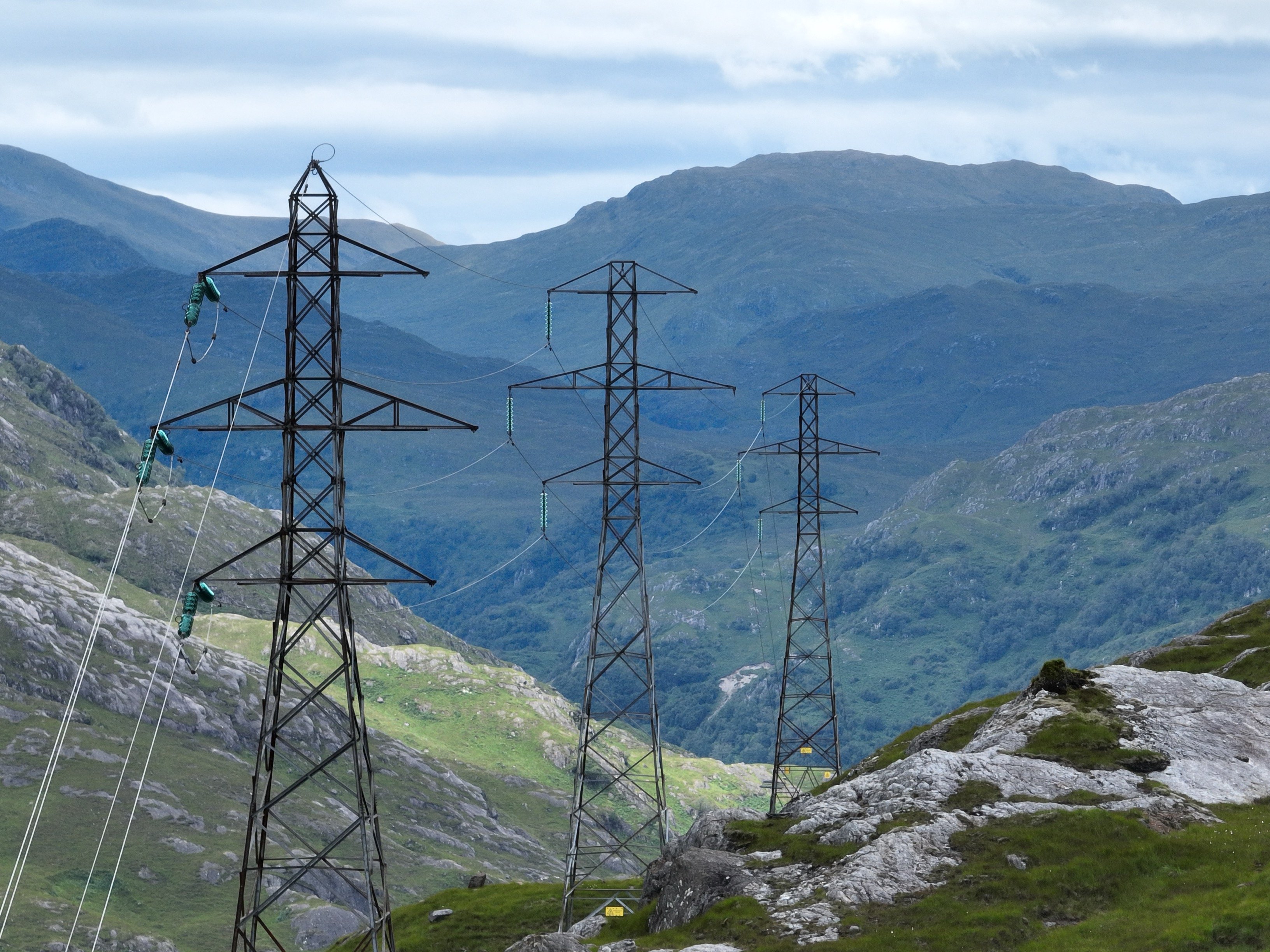 mountainous view with 3 pylons