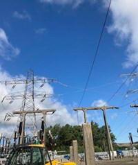 Concrete and metal substation infrastructure.