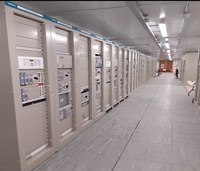 Floor to ceiling machinery control panels.