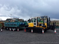 A construction vehicle with caterpillar tracks.