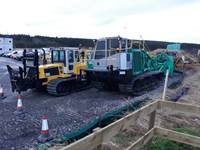 A construction vehicle with caterpillar tracks.