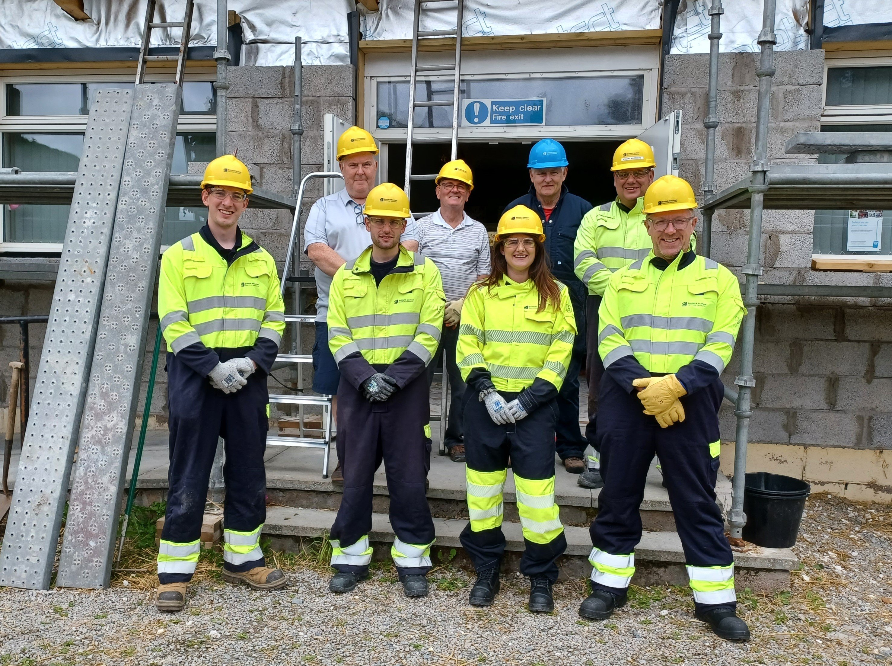 1. SSEN Transmission_The team of SSEN Transmission volunteers along with local community volunteers outside the Bothie ahead of the clear-up..jpg