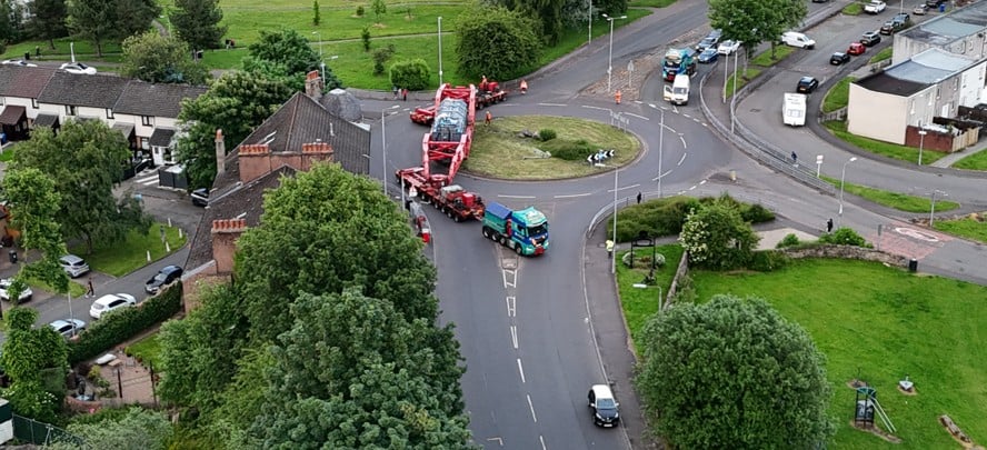 Transformer deliver coming around a roundabout 