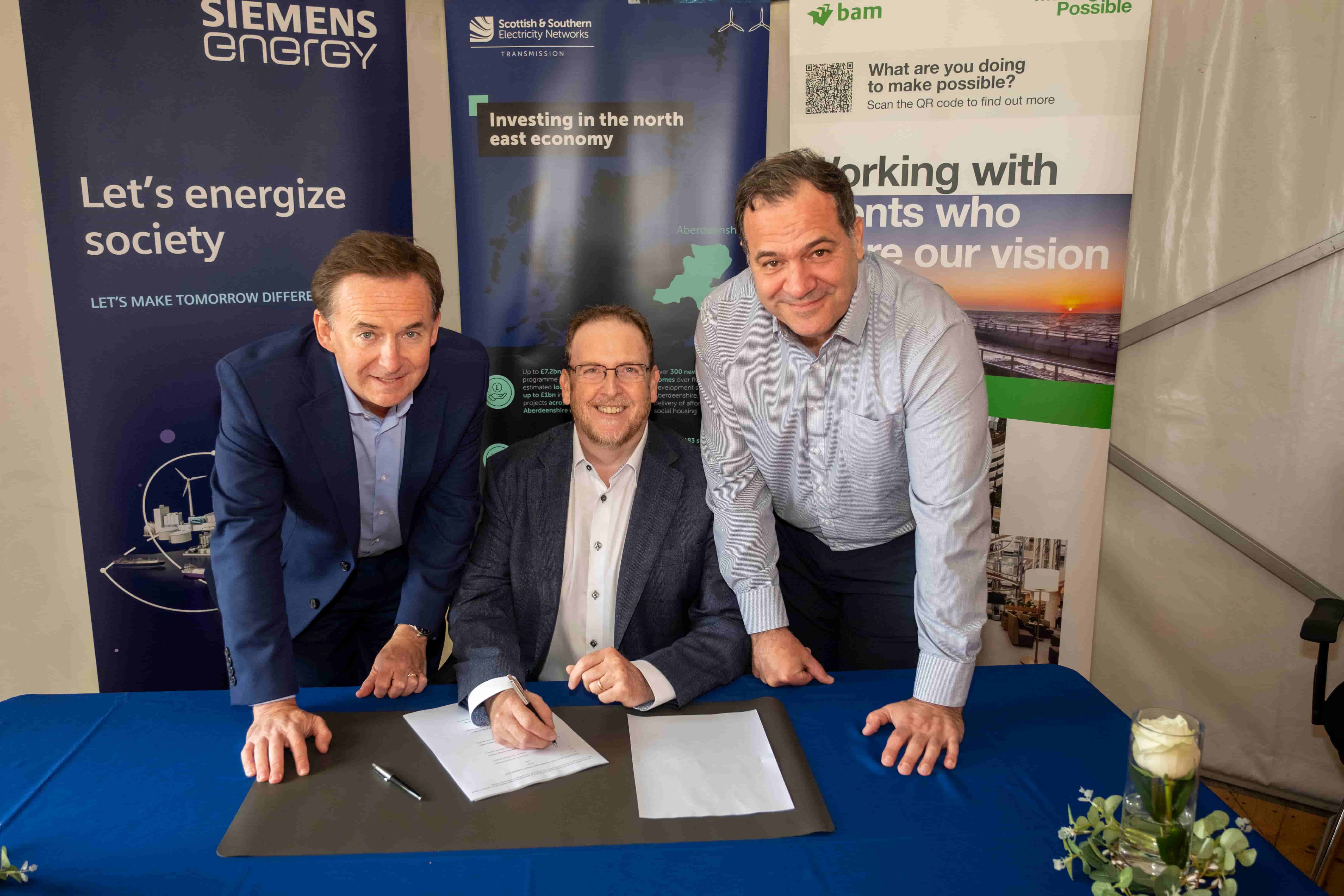 At a signing ceremony in Aberdeenshire earlier today, (from left to right) Carl Trueman, Head of Substations Business at Siemens Energy UK&I, Paul Cooley, Director of Onshore Capital Delivery at SSEN Transmission,  Adrian Collins, Director of Energy Networks Scotland at BAM.