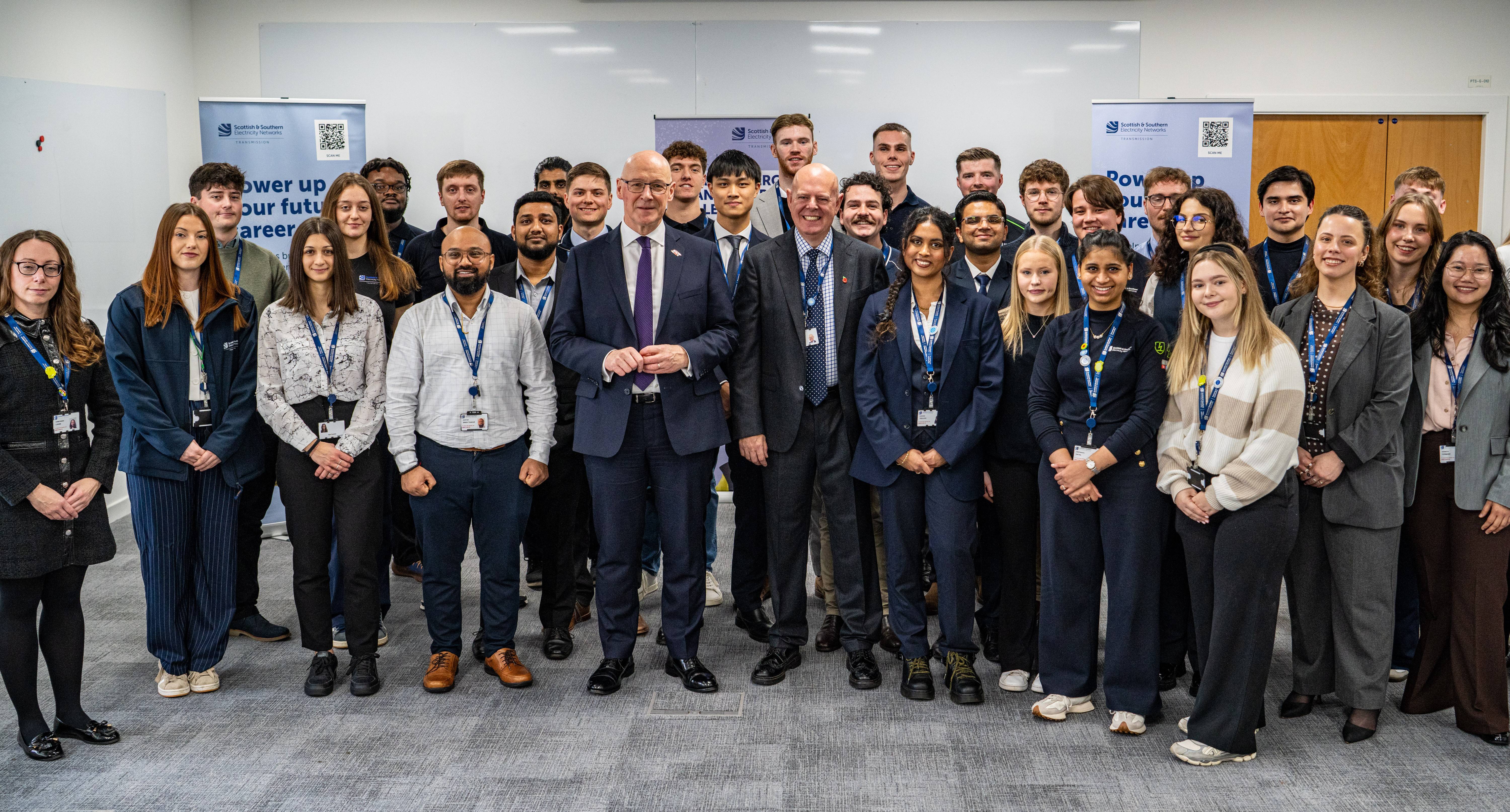 SSEN Transmission_First Minister John Swinney and Managing Director Rob McDonald with current SSEN Transmission graduates and trainees in Perth.jpg
