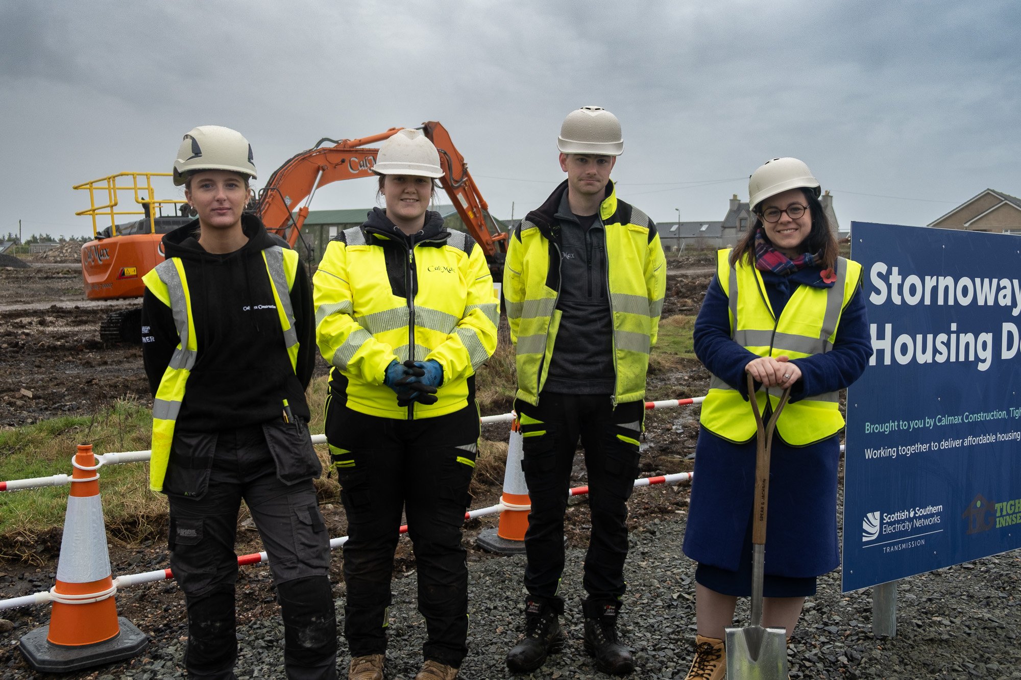 Deputy First Minister with local apprentices working at Stornoway Airport Housing Development site