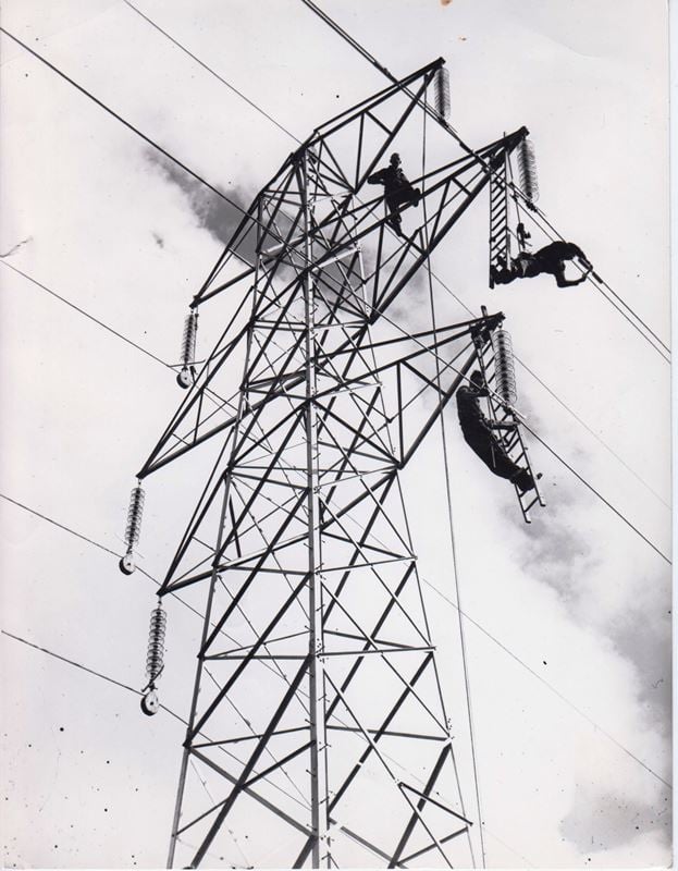 SSE Heritage archive photograph of workers on a 132kV line on the north of Scotland transmission network in the 1960s.jpg